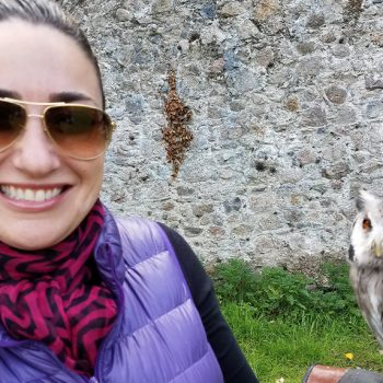 Dr. Vivian Roknian holding an Owl