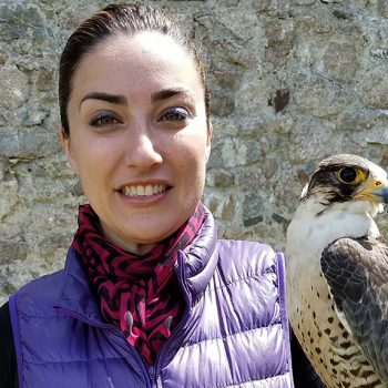 Dr. Vivian Roknian holding an Eagle