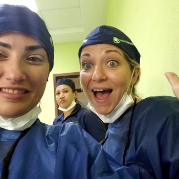 Dr. Vivian Roknian taking selfie with the team