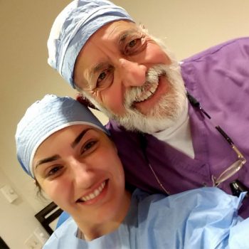 Dr. Vivian Roknian taking selfie with senior dentist