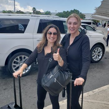 Dr. Vivian Roknian land at the airport with her friend