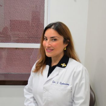 smiling face of a Dr.V. Roknian