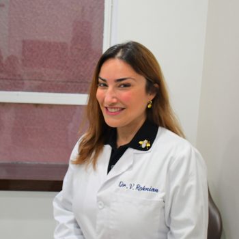 smiling face of a Dr. Vivian Roknian