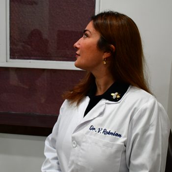 Dr. Vivian Roknian checking the monitor