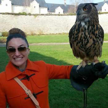 Dr. Vivian Roknian holding an Owl